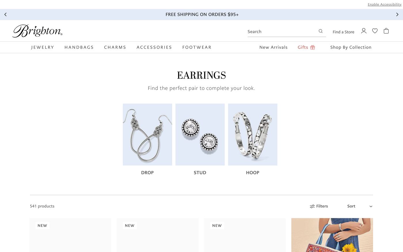 Brighton jewelry store displaying extensive charm-based earring collections and variety options